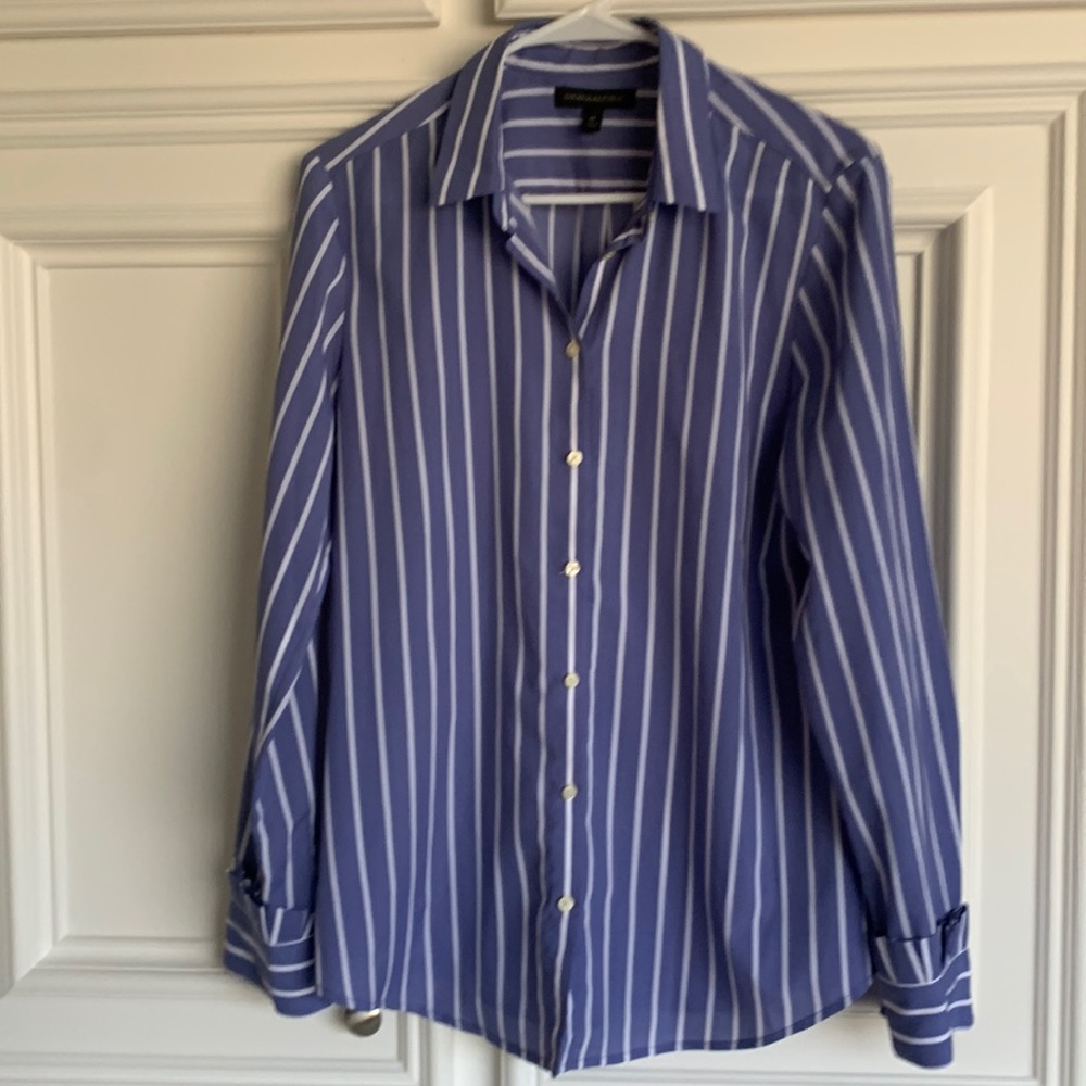 Beautiful blue and hire striped blouse. 27 inches long and 20 inches pit to pit.